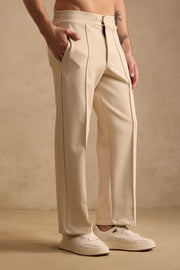 THE PIN TUCK PANTS IN SAND BEIGE