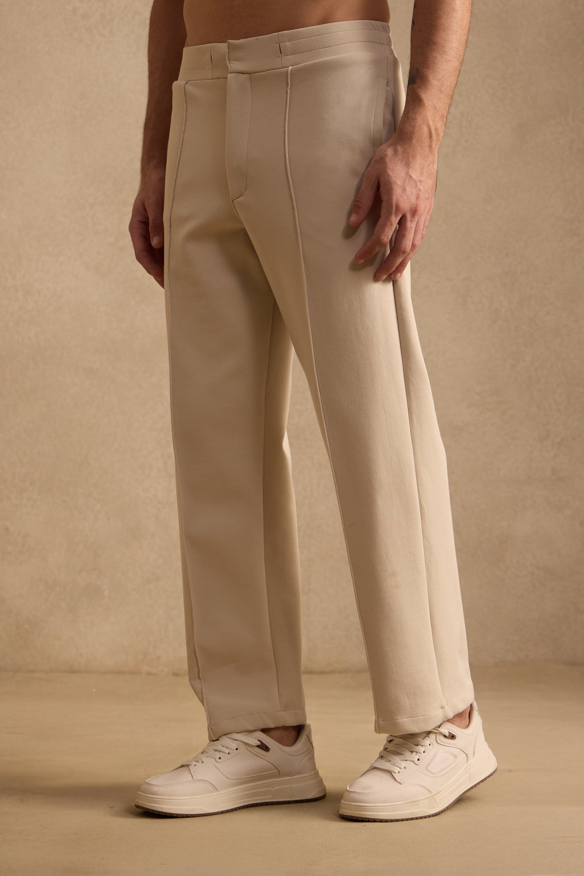 THE PIN TUCK PANTS IN SAND BEIGE