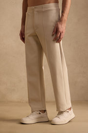 THE PIN TUCK PANTS IN SAND BEIGE