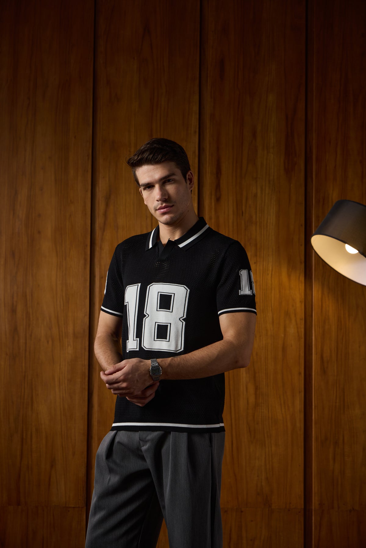 THE VARSITY MESH POLO IN DEEP BLACK