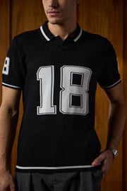 THE VARSITY MESH POLO IN DEEP BLACK