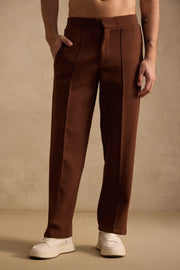 THE PIN TUCK PANTS IN RUST BROWN