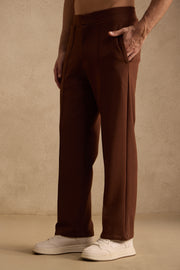 THE PIN TUCK PANTS IN RUST BROWN