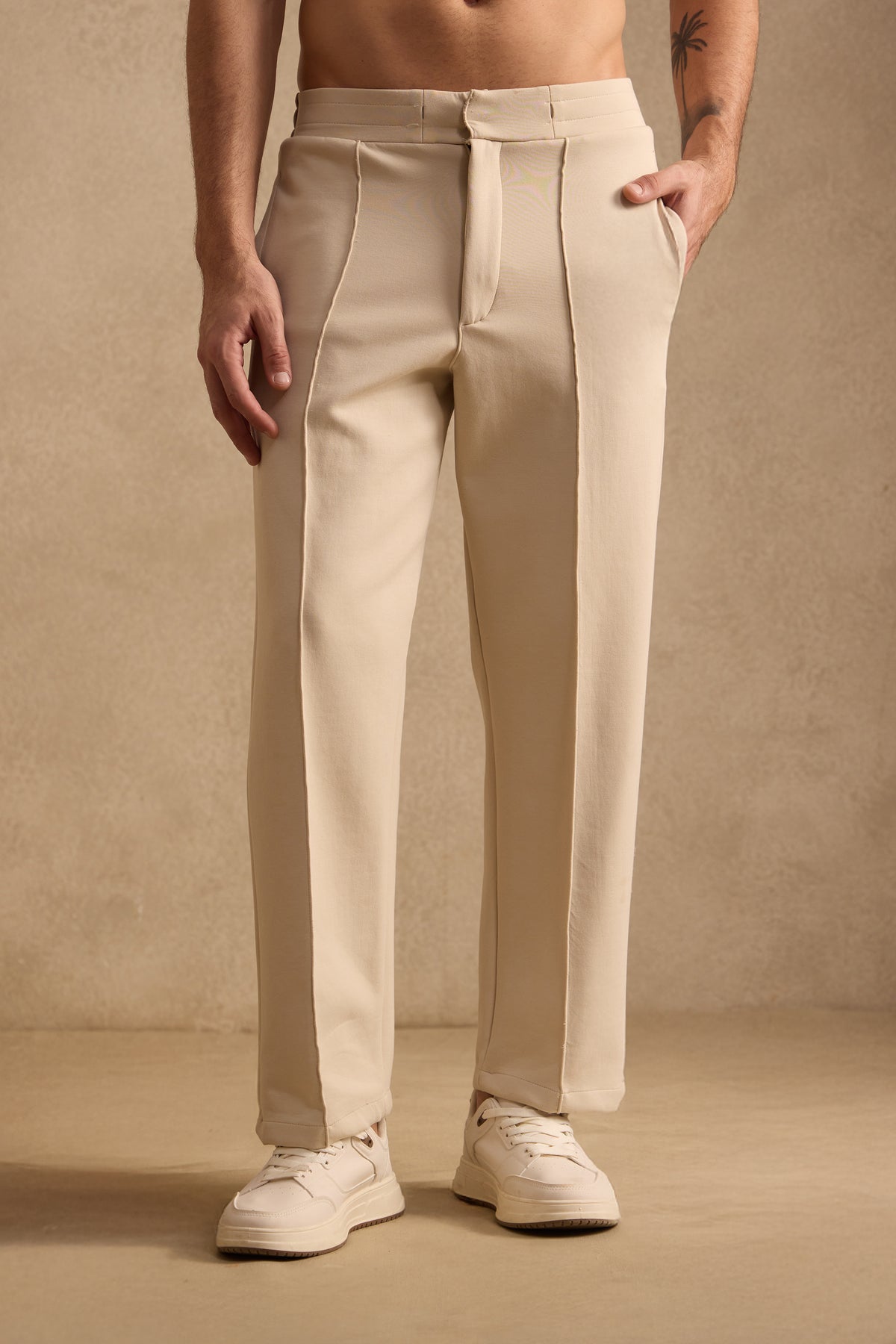 THE PIN TUCK PANTS IN SAND BEIGE