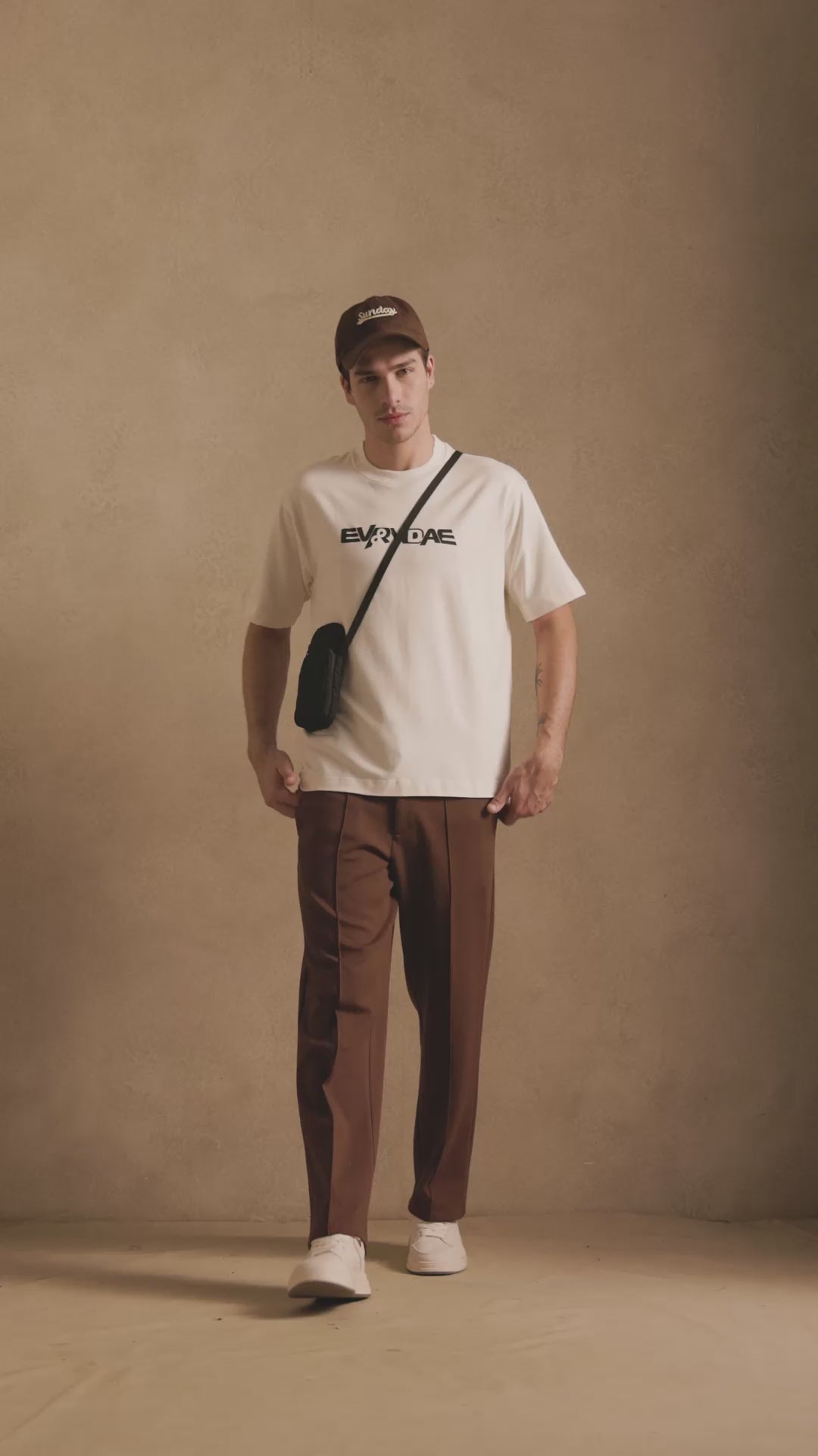 THE PIN TUCK PANTS IN RUST BROWN